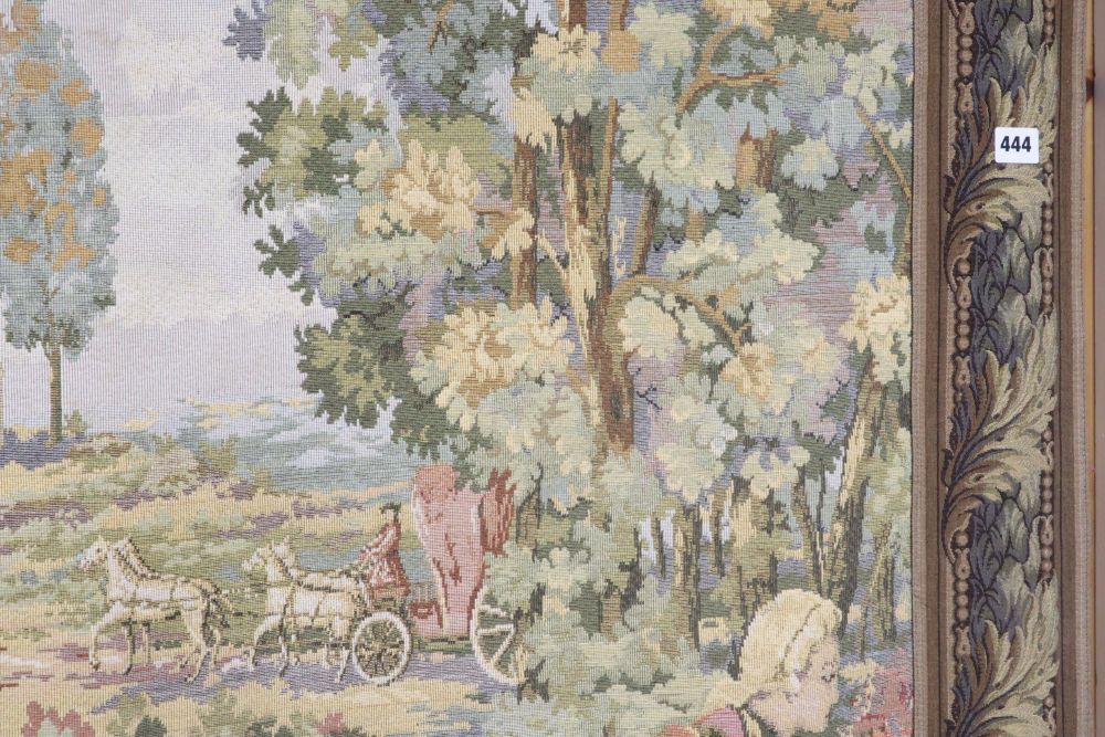 An Aubusson style machine woven hanging tapestry depicting a hunting party, with pole